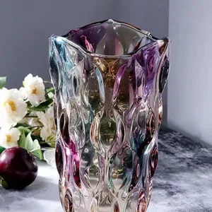 Detailed view of colorful crystal glass vase with textured surface for home decor.