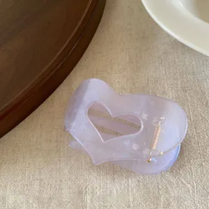 Pearlescent jelly heart hair claw clip, cute translucent hair catcher for daily styling wear.