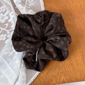 Vintage dark brown floral scrunchie for women, elegant hair tie ponytail accessory.