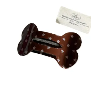 Molle a becco d'anatra con motivo stella marrone grazioso accessorio per capelli da donna e ragazza.