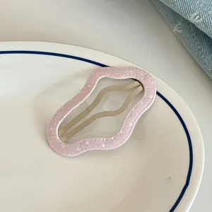 Sweet pink cloud fabric snap hair clip detail, cute aesthetic hair accessory for daily wear.