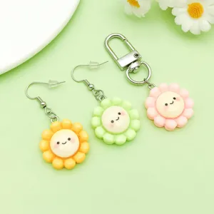 Süße Harz Smiley Sonnenblume Anhänger und Ohrringe Set für DIY Schmuckherstellung.