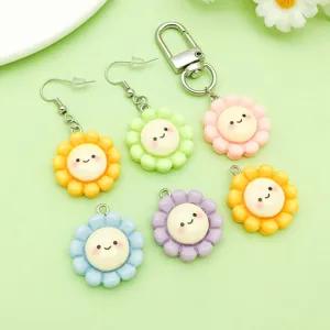 Bunte Harz süße Cartoon lächelnde Sonnenblume Anhänger Schlüsselanhänger DIY Schmuck.