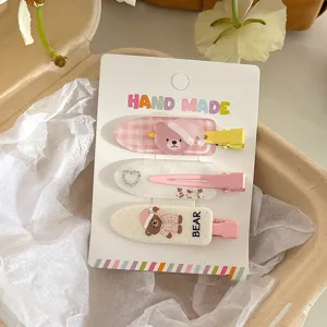 Vue détaillée de pince à cheveux mignon ours dessin animé coréen, accessoires filles.