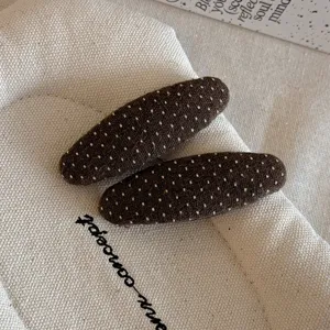 Fermagli per capelli in tessuto a pois marrone, mollette ovali carine per styling quotidiano.