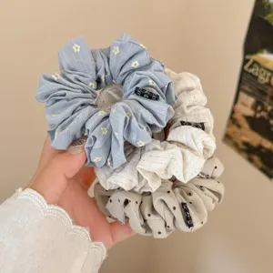 Ensemble de chouchous en tissu avec motifs floraux et pois, doux et élastiques.