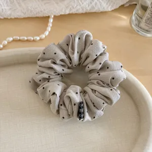 Chouchou en tissu à pois élastique esthétique accessoire de coiffure quotidien.