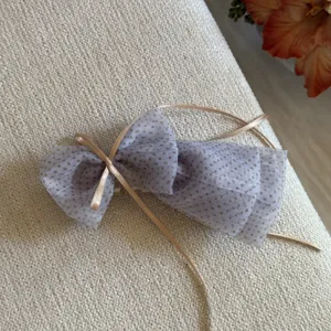 Detailed close-up view of the sweet organza polka dot bow hair clip with delicate ribbon.