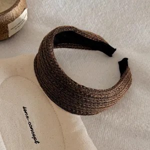 Brown knitted wide hair hoop detail, vintage textured headband for women, autumn fashion hair accessory.