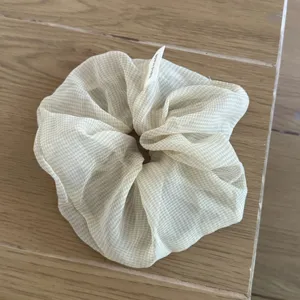 Chiffon plaid hair scrunchie, soft lightweight design for casual daily styling and ponytails.