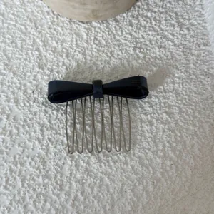Dark blue bow hair comb detail, elegant acetate and metal side insert comb for women.