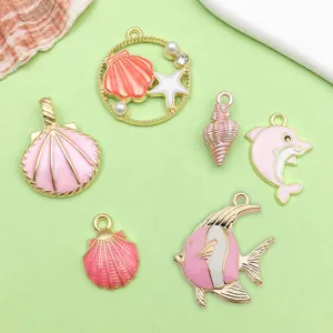 Pink enamel alloy ocean shell dolphin starfish charms for DIY bracelet jewelry making detail view