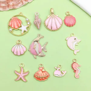Pink enamel ocean shell dolphin starfish alloy charms for DIY jewelry making and bracelets.
