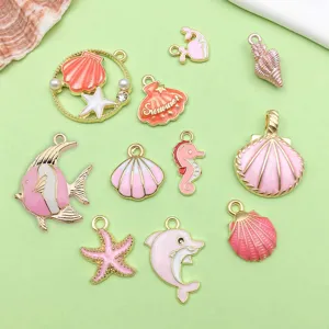Cute pink enamel alloy ocean shell starfish dolphin charms for DIY bracelet making.