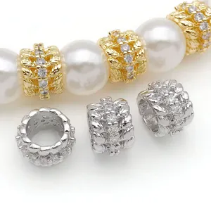 Gold and silver wheat zircon spacer beads for DIY jewelry making and bracelet design details.
