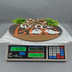 Gewichtsangabe für dieses Halloween Holz Türschild mit Gespenstern und BOO Schriftzug.