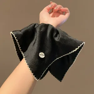 Korean vintage black satin scrunchie with white lace edge, elegant hair accessory for women.
