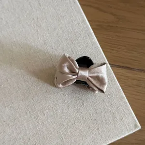 French satin bow hair claw clip elegant hair accessory for women girls styling and daily wear