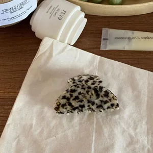 Leopard print acetate hair claw clip, French style elegant half up hair styling accessory.