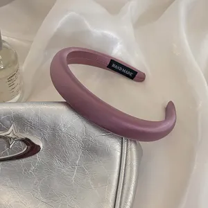 Purple satin padded headband for women, chic wide hair hoop for daily wear and elegant styling.