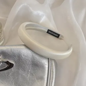 White satin padded headband, elegant thick hair hoop for women's daily wear and travel styling.