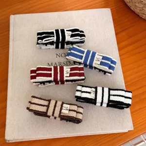 Korean contrast color striped knitted bow banana hair clip for women elegant hair accessory