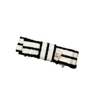 Korean contrast color striped knitted banana hair clip for women with cute woven label stylish.