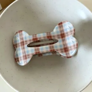 Cute plaid bone hair claw clip for women, stylish half-up hair accessory for daily wear.