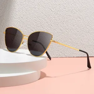 Elegantes gafas de sol ojo de gato de metal dorado para mujer, lentes negras de moda.