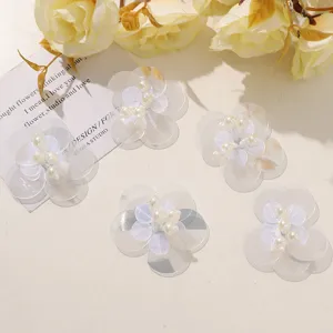 Transparent sequin pearl flower appliqué detail view, perfect for DIY craft and garment accessories.