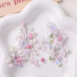 Handmade beaded flower tassel accessories DIY pearl floral charm for earrings and crafts.