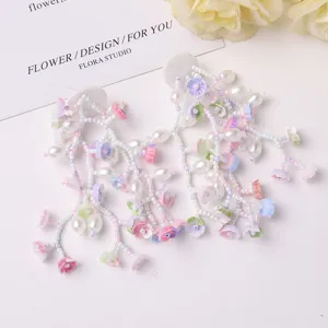 Exquisite dopamine beaded pearl floral long tassel earrings detail view, sweet style.
