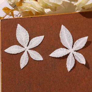 White lace embroidered flower patches for DIY earrings, hair accessories and holiday fashion styling.