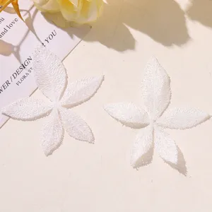 White lace embroidered flower appliques for DIY jewelry, hair accessories, and clothing decor.