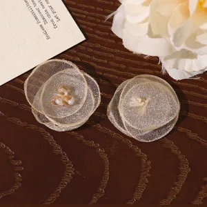 DIY mesh flower petal fabric crystal appliques for handmade hair clips crafting and sewing.