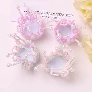 Accesorios DIY de flores de cuentas hechas a mano, dijes de perlas para ropa y bolsos.