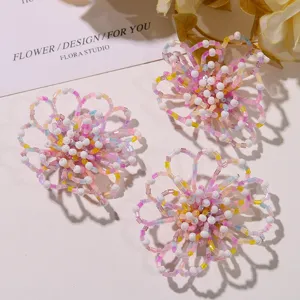 Detailed close-up of handmade beaded hollow flower DIY accessories, sweet and colorful.