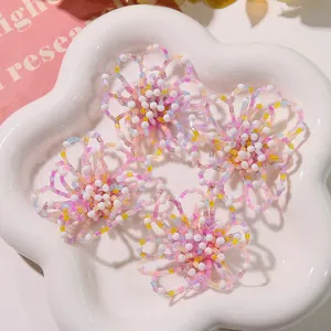 Beaded hollow flower DIY accessory detail showing colorful seed beads texture closeup view