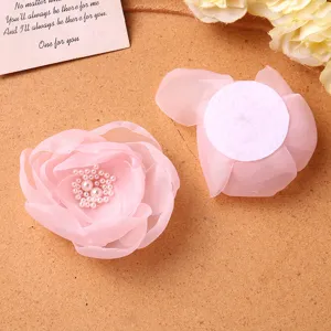 Sweet mesh flower hair clip for women, pearl center, ideal for spring summer beach wear.