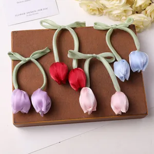Double head tulip fabric ribbon bow hair accessories detail shot, handmade DIY hair clip parts.