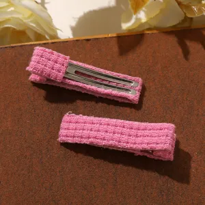 Sweet pink knitted hair clips, cute candy color wool fabric wrapped bb clip detail view.