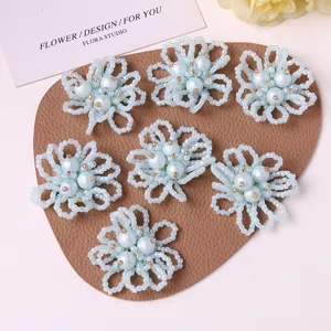 Light blue beaded pearl hollow flower DIY accessories for earrings, hair clips, and clothing.