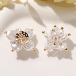 Detailed view of pearl crystal camellia DIY flower charm, brooch and earring accessory.