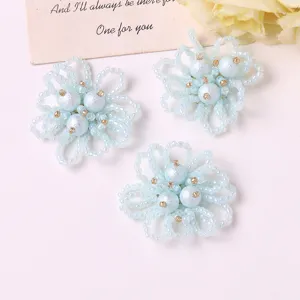 Blue beaded pearl hollow flower close-up view for DIY earrings hair clips accessories.