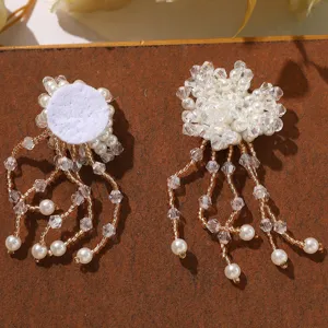 Handmade crystal pearl beaded flower tassel detail shot showing exquisite craftsmanship and texture.