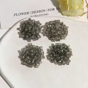 Crystal beaded flower cluster detail, sparkling DIY craft accessory for clothing, shoes, and decor.