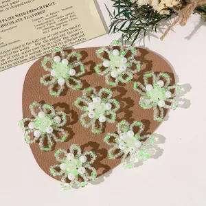 Handmade beaded flower DIY accessories, green and white sweet style crafts for jewelry making.