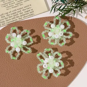 Handmade beaded flower DIY accessories for cute earrings, hair clips, and crafts.