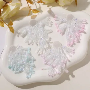 Handmade beaded tassel patch detail shot, perfect for DIY earrings and brooches crafting.