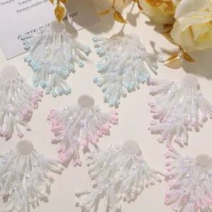 Handcrafted beaded flower fringe patches, perfect for DIY earrings, hair accessories and clothing.